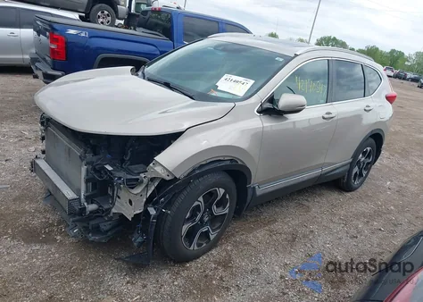 2019 Honda Cr-V Touring z USA, uszkodzony, nr VIN 2HKRW2H94KH623003